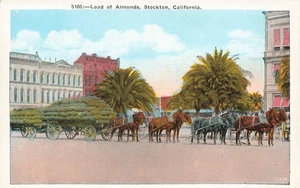 STOCKTON CA HORSE-DRAWN WAGONS LOAD OF ALMONDS VINTAGE POSTCARD 092825 U - Picture 1 of 2