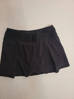 Falda deportiva de tenis Lucy Skort talla pequeña bolsillos cordón negra para mujer  Foto 1 de 4