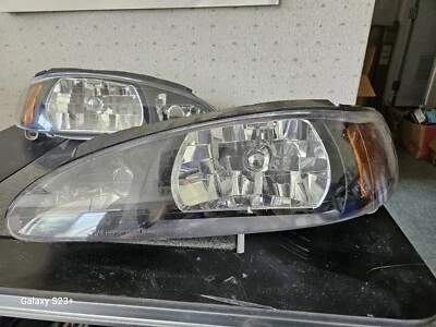 Juego de faros Ford Escort/Mercury Tracer, bombilla halógena inc., Vision PN 10095-L Foto 1 de 4