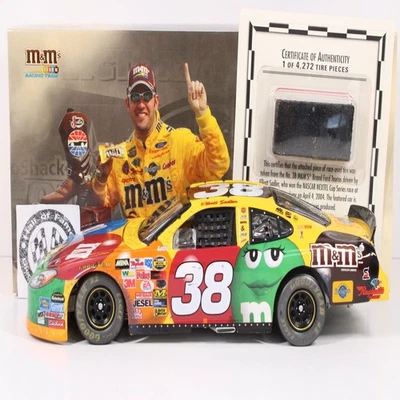 ELLIOTT SADLER 2004 ACTION #38 TEXAS WIN M&M'S FORD W/TIRE PIECE /240 MADE XRARE - Image 1 of 4