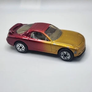 1993 Matchbox 1:58 Gold/Red Mazda RX-7 Sports Car Thailand  - Picture 1 of 13