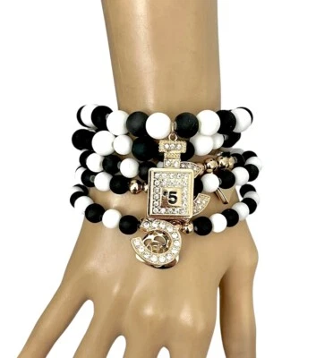 1.75" Wide 5 Rolls Black white Beads Golden Charm Statement Stretchable Bracelet - Image 1 of 3
