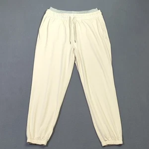 Pantalones para mujer Vuori L crema halo calentamiento jogger rendimiento elástico salón - Imagen 1 de 13