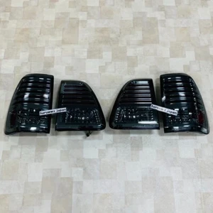 For Toyota 98-05 Land Cruiser 100 Series LED Smoke Rear Brake Taillights Set New - Picture 1 of 20