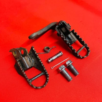 ПОДНОЖКИ DRZ125 ПОДНОЖКИ ОПОРЫ ПОДЛИННЫЙ OEM SUZUKI DRZ 125 L (2003-2019) - Изображение 1 из 4