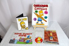 The Simpsons Lot - Sign + Door Hanger + Bart Bendable Toy + Drawing Book + DVD