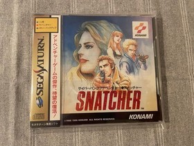 Sega Saturn Snatcher with obi, postcard and sticker, in good condition