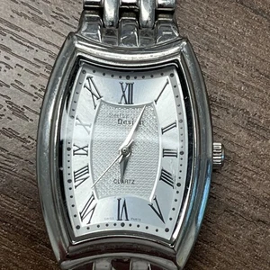 Elegant Silver tone stainless steel ladies watch. Needs battery and has no back - Picture 1 of 4