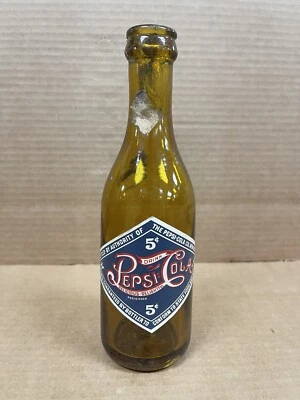 Vintage Paper Label Embossed 5 Cent Pepsi Cola Bottle Amber New Bern NC 10oz. - Image 1 of 4