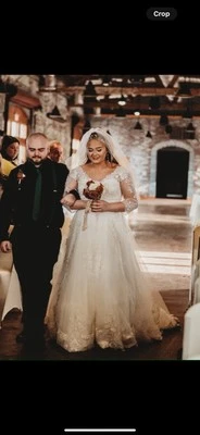 ivory lace wedding dress, size 12, needs to be dry cleaned, had bustle added - Image 1 of 4