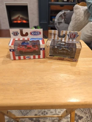 Lot of 2 M2 Ford Mustang Gassers 1965 Red & 1966 Black, NOS Plastic Case & Stand - Image 1 of 3