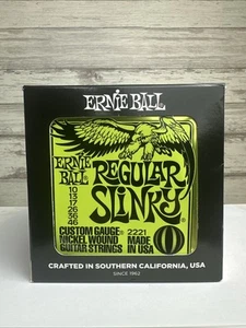 2221 Ernie Ball Regular Slinky Nickel 10-46 Saiten für E-Gitarre 12 SÄTZE - Bild 1 von 5