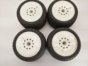 4x Rare Proline Bow-Tie #1113 40 Series 1/8 Monster Truck Tires 14mm hex Wheels - Picture 1 of 7