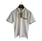 Gucci Iconic GG Logo bestickt schmale Passform weiß/grün Poloshirt Größe L