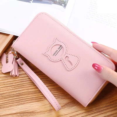 Cartera sin asas para mujer con borla y cremallera larga con correa para muñeca porta tarjetas de crédito Foto 1 de 4