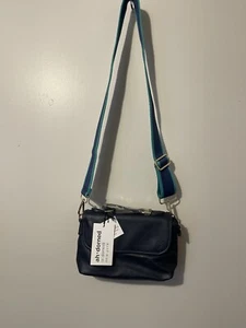 Ah-Dorned Crossbody Bag Blue 2 Snap Easy Closure 2 Guitar Straps Leather NWT - Picture 1 of 6