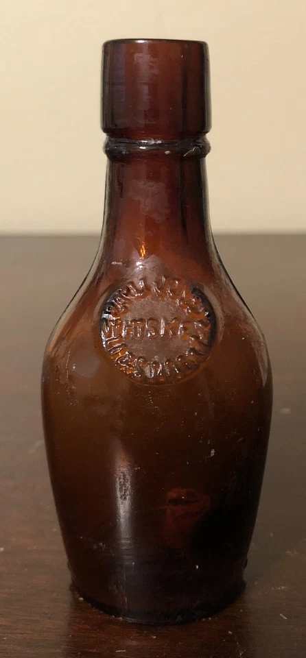 Botella ámbar miniatura de whisky Paul Jones vintage de 4" - Louisville, KY Foto 1 de 4