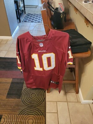 CAMISETA NIKE ROBERT GRIFFIN III AUTOGRAFIADA CON FIRMA LEGIBLE OSCURA ENMARCABLE Foto 1 de 4