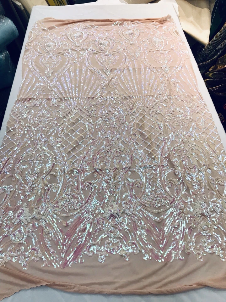 PINK IRIDESCENT DAMASK SEQUINS DESIGN ON A 4 WAY STRETCH NUDE MESH-BY YARD. - Image 1 of 4