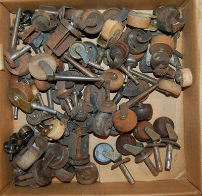 50 Plus Antique Iron and Wood Furniture Casters LOT - Image 1 of 4