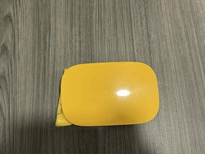 2004-2005 Audi B6 S4 Imola Yellow OEM Gas Door - Image 1 of 3