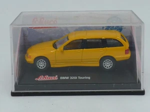 SCHUCO PETITE VOITURE JAUNE BMW TOURING - Picture 1 of 6