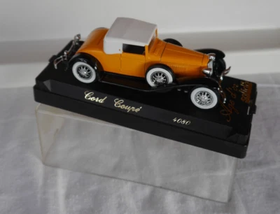 Solido  1: 43 - 4080  Cord Coupe orange mit Plasehaube - Bild 1 von 3