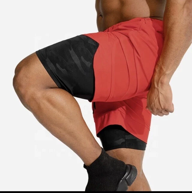 Pantalones Cortos 2 en 1 Bolsillo Teléfono Calce Cruzado Para Hombre Gimnasio Fitness con Comprensión Interior  Foto 1 de 4