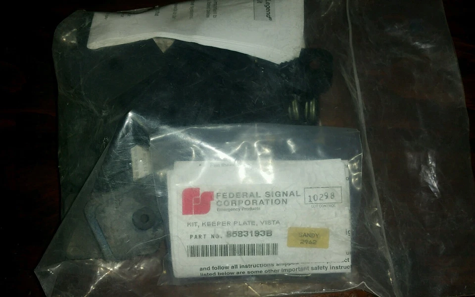Federal signal corporation kit keeper plate, vista sandy 2962  - Image 1 of 1