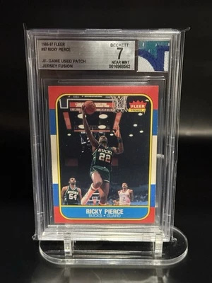 1986-87 FLEER BASKETBALL #87 RICKY PIERCE JERSEY FUSION BGS 7 GU SICK PATCH - Image 1 of 2