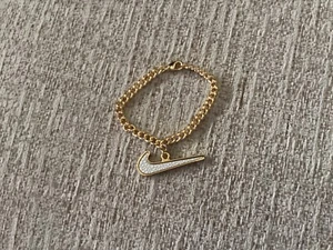 Nike Swoosh Charm Bracelet (Gold Colour on Metal) BNWT - Picture 1 of 3