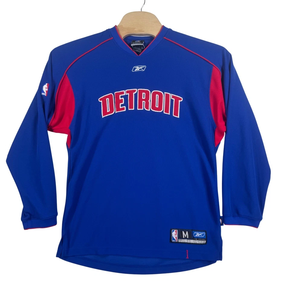 Camiseta deportiva de calentamiento de manga larga de baloncesto de la NBA Reebok Detroit Pistons para hombre M Foto 1 de 4