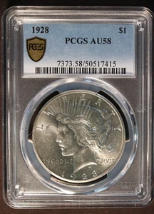 1928 Peace Silver Dollar - PCGS AU 58 - Gold Shield - Picture 1 of 3