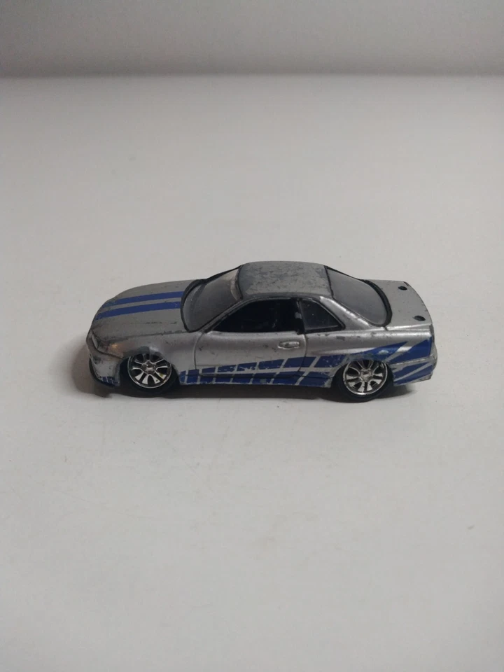 Johnny Lightning Hollywood Rápido y Furioso Nissan Skyline GTR R34 Suelto Foto 1 de 4