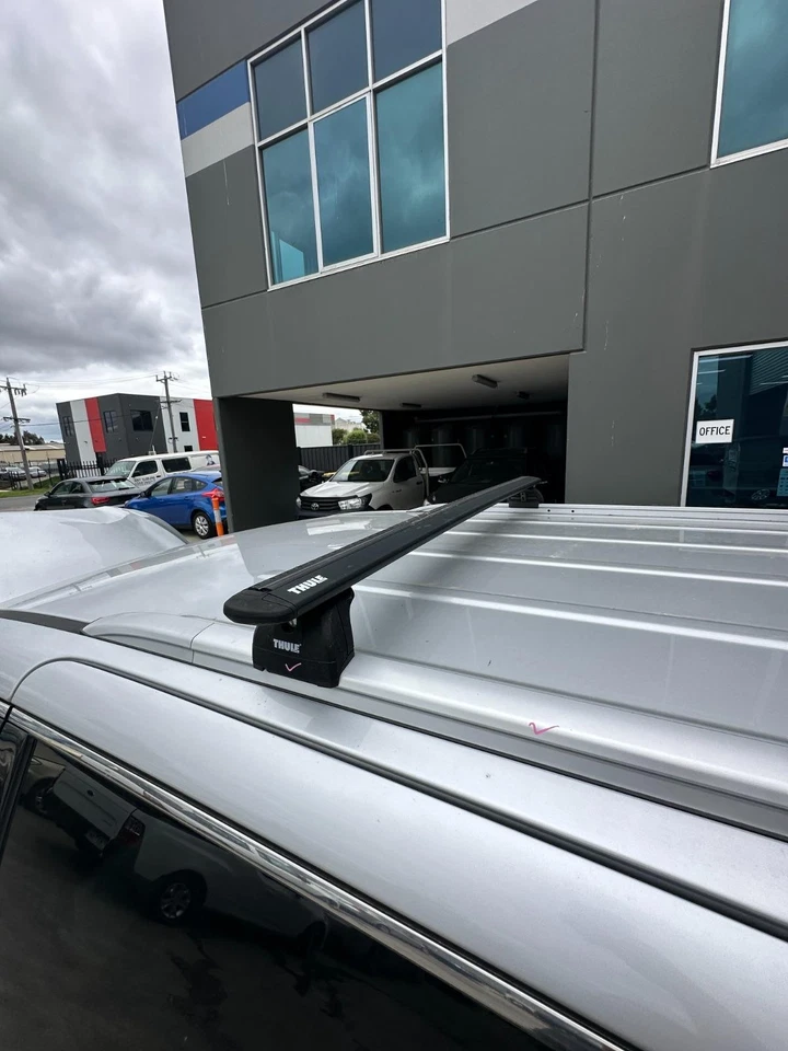 KIA CARNIVAL/GRAND CARNIVAL YP 12/2014-10/2020 ROOF BARS PAIR AFTERMARKET THULE - image 1 of 4