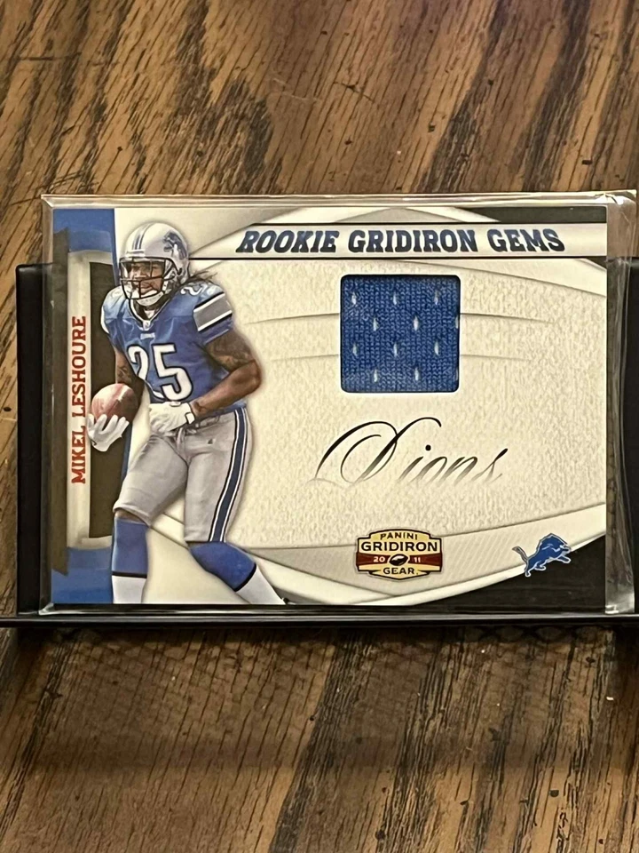 MIKEL LESHOURE 2011 ROOKIE GRIDIRON GEMS DETROIT LIONS RELIC JERSEY PATCH RC /99 - Image 1 of 2