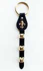 BLACK LEATHER BELL STRAP WITH FLEUR DE LIS CHARM AND BRASS PLATED BELLS