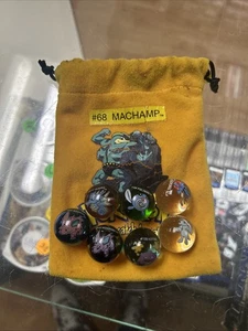 Pokémon Murmeln Lot mit Machamp Tasche - 7 Pokémon Murmeln - Bild 1 von 1