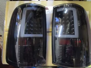 Xtune Fit 09-18 Ram 1500 LED Tail Lights - Black Smoke (ALT-ON-DR09-LBLED-BSM) - Picture 1 of 3
