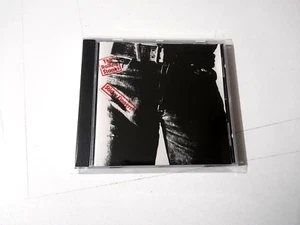 THE ROLLING STONES "STICKY FINGERS" CD 10 TRACKS COMO NUEVO - Foto 1 di 2