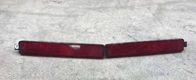 08-13 Cadillac CTS, GMC Acadia, Saturn Vue, Pontiac parachoques trasero cubierta reflector Foto 1 de 4