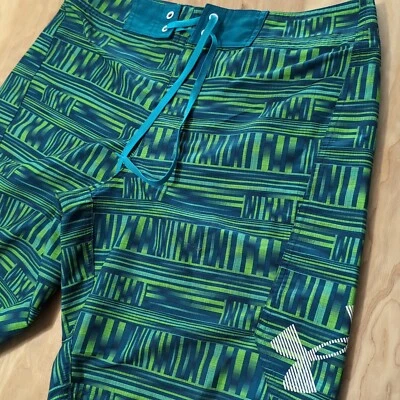 Pantalones cortos de natación Under Armour sueltos HeatGear azul verde estampado para hombre talla 34 Foto 1 de 4
