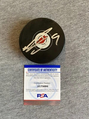 NEW JERSEY DEVILS- ALEXANDER HOLTZ AUTOGRAPH LOGO PUCK PSA AL75094 - Image 1 of 2
