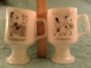 VINTAGE MILK GLASS PEDESTAL MUGS SET OF 2 BILL DAVEY CARTOON TENNIS PLAYER CUPS - Picture 1 of 12