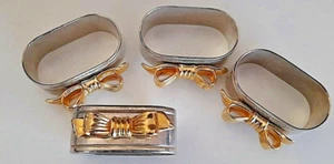 VINTAGE SET of 4 NAPKIN SERVIETTE RINGS ..CHROME with GILT BOW - Bild 1 von 3