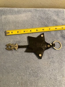 LLAVERO ESTRELLA CUERO VINTAGE GEORGE, GINA & LUCY GG&L USADO LEER - Imagen 1 de 10