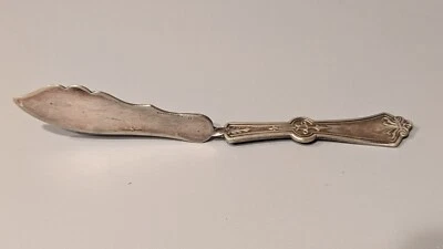 Antiguo cuchillo de mantequilla persa plateado Rogers & Brother mango retorcido 1871 Foto 1 de 4