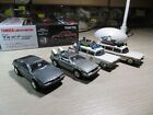 hot wheels DELOREAN DMC-12 + Back to the future real riders + Ghost Busters ECTO