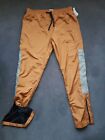 'Elbowgrease' Athletic Track Pants Gold Large W32 L30.  Lined zipped hem.