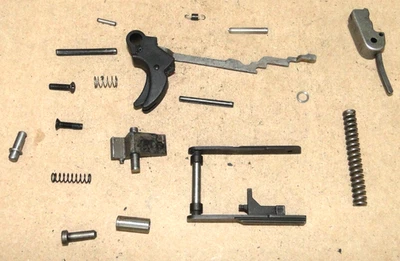 WALTHER "PPQ" .22LR FULL SIZE PARTS, TRIGGER ASSY, HAMMER, SLIDE STOP, SPRING, - Image 1 of 4